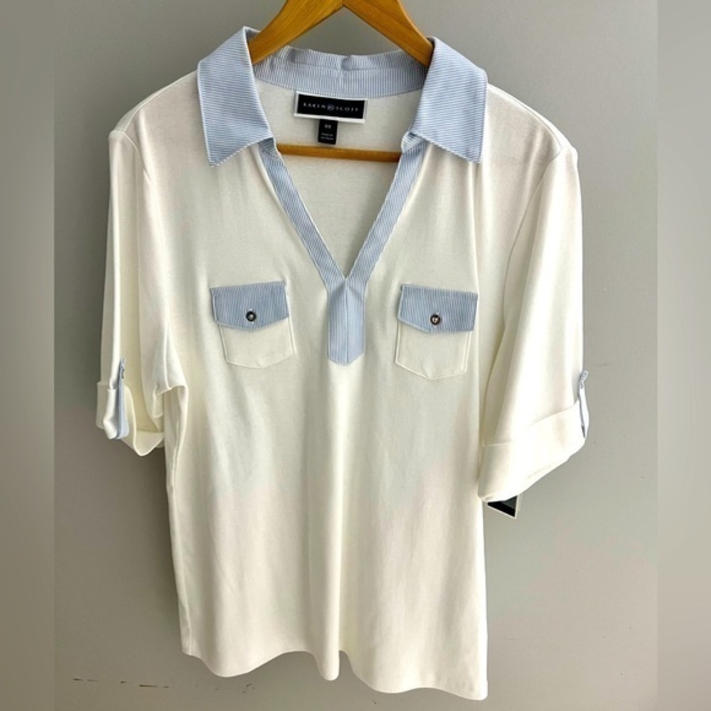 Women’s short cuffed sleeve collar shirt. Size OX Soft stretchy sides.